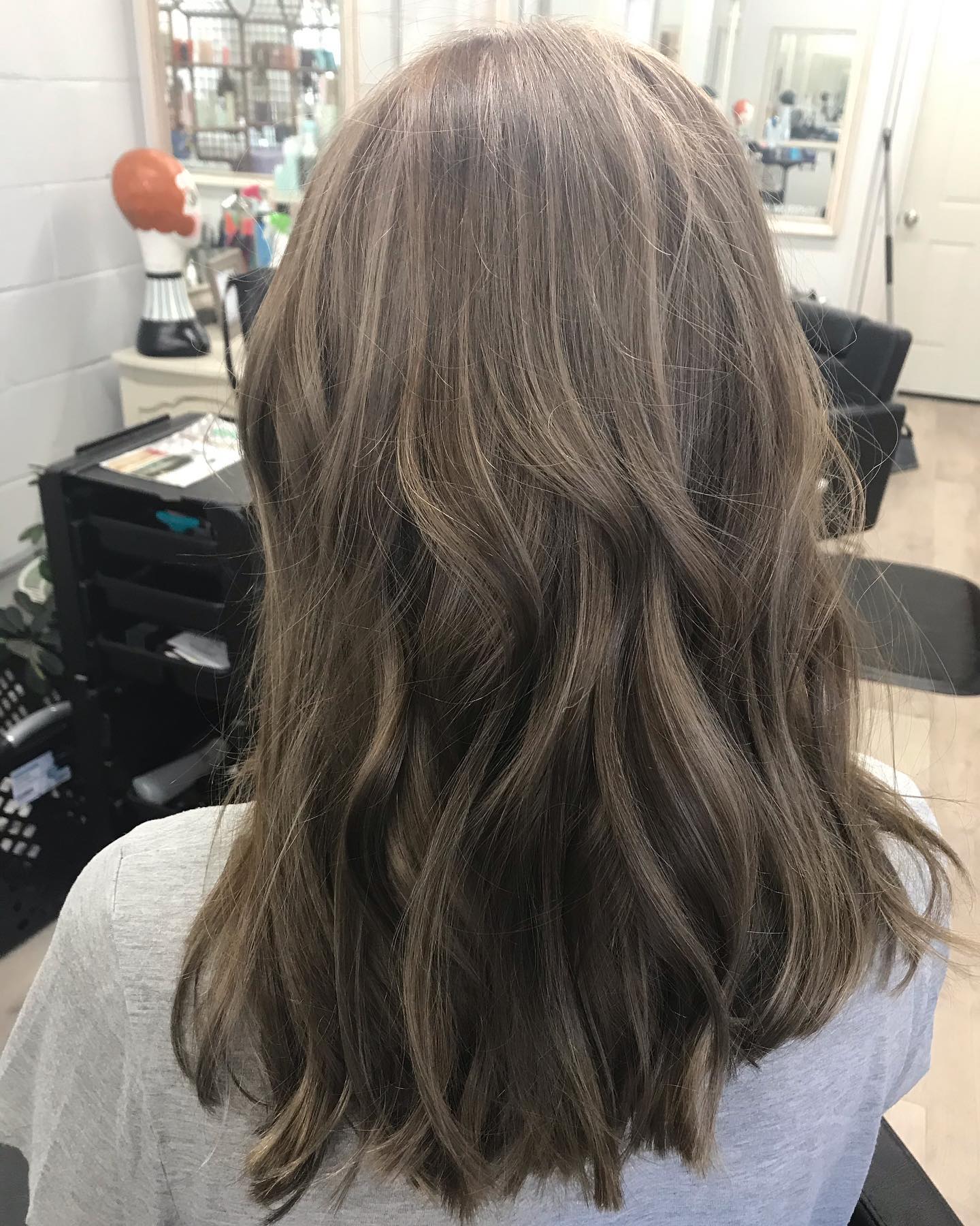 Ash brown waves, finished in the salon chair