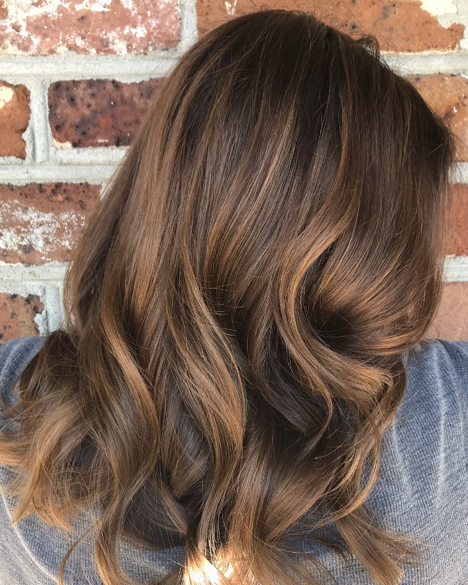 Caramel brown waves at shoulder length
